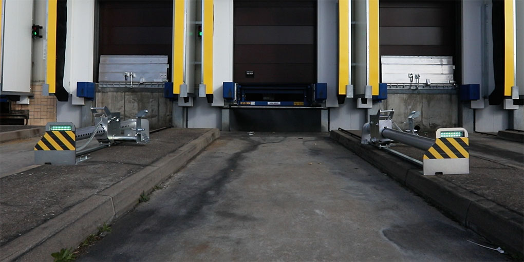 Quais de chargement en industrie agro-alimentaire avec bloqueurs de roue sur guide-roue béton